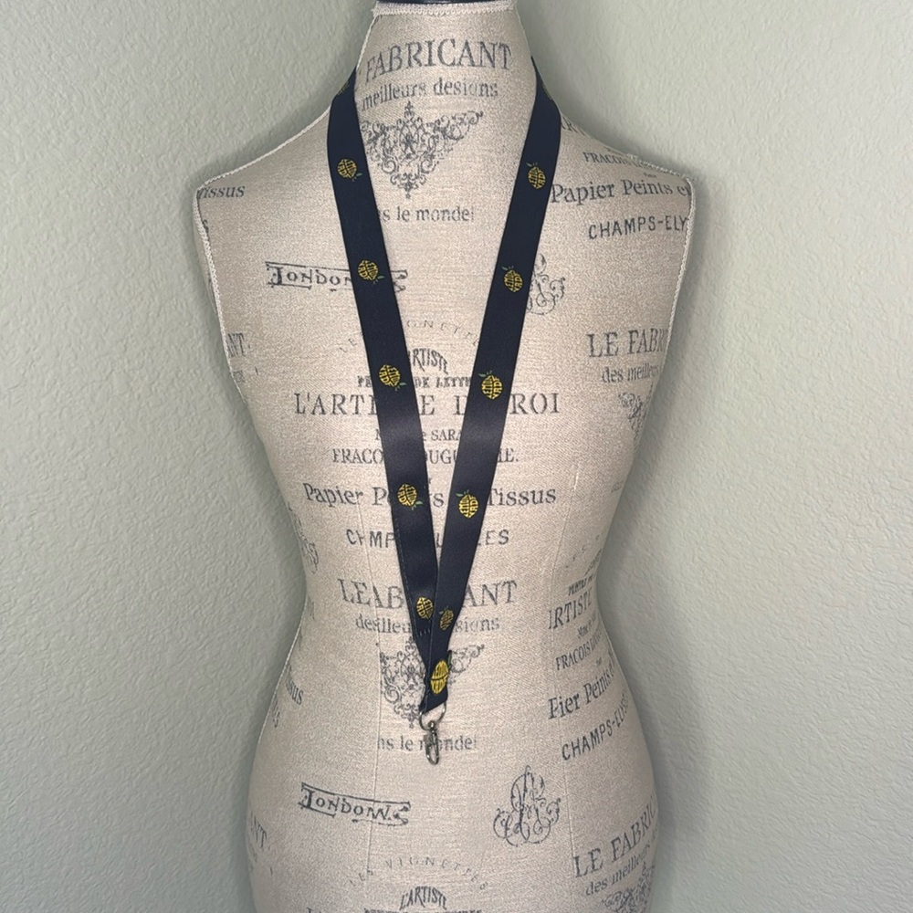 Lemonade Black & Lemon Graphic Lanyard with Pin.